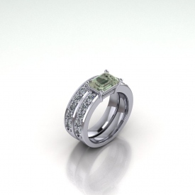 14kt white gold wedding set with an emerald cut, green amethyst center stone set horizontally and round diamonds on both the engagement ring and the wedding band.