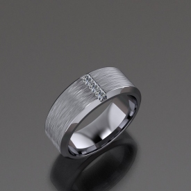 10kt white gold gents band with channel set princess cut diamonds set vertically, a brush finish, and high polish beveled edges.