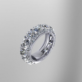 18kt white gold band with prong set round brilliant cut diamonds.