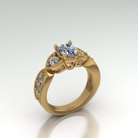 14kt yellow gold antique style diamond ring with an oval cut diamond center stone and round brilliant cut side stones, there is a beading finish and scroll work on the face of the ring.