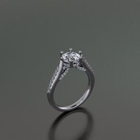14kt white gold engagement ring with bead set round brilliant cut diamonds down either side and a halo under the center diamond with scroll work under the halo that has prong set diamonds set throughout.