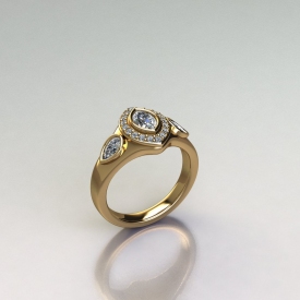 14kt yellow gold ring that has a bezel set marquise shaped diamond in the center and a halo with round brilliant cut diamonds surrounding it, and two pear shaped diamonds on either side that are bezel set.