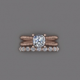 14kt rose gold wedding set that has a solitaire style engagement ring with a twisted-cable shank, and a wedding band that has shared prong-set round brilliant cut diamonds across the top.